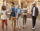 Group of diverse college students walking to class